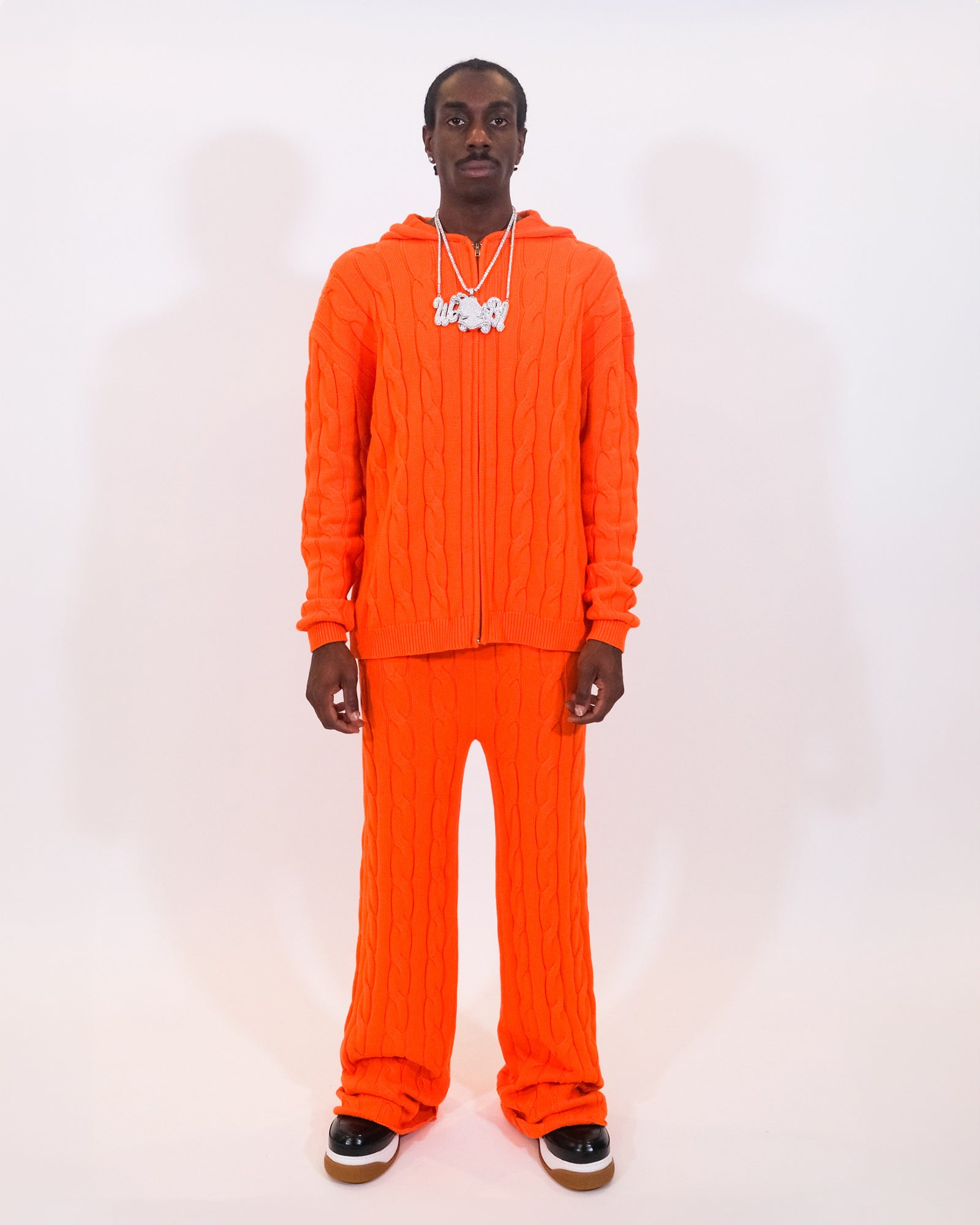 ORANGE CABLE KNIT TROUSERS